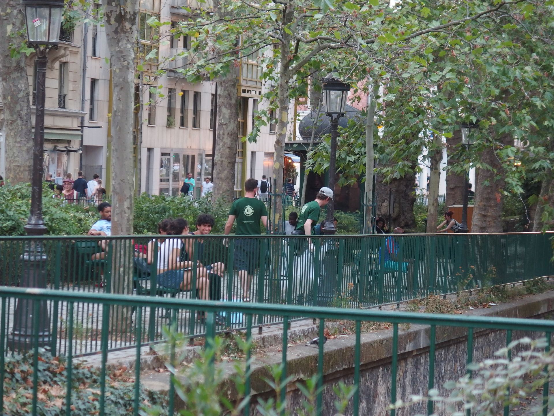 Creatives of Tomorrow volunteers cleaning up a public square in Paris
